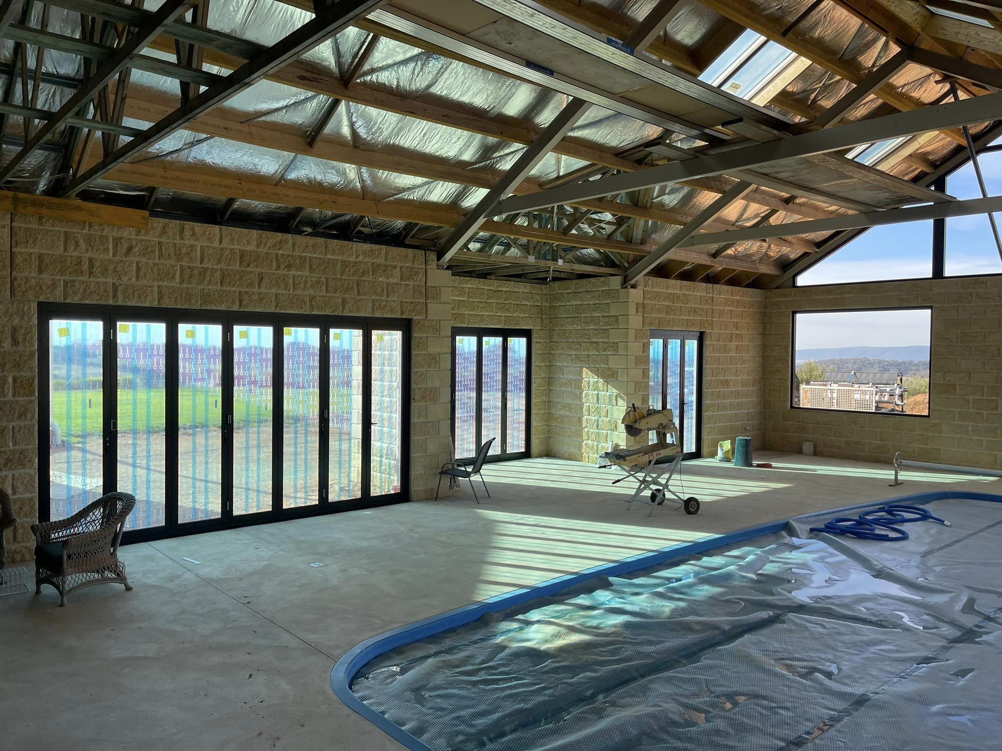 Indoor Pool Enclosure project completed by Insight Glass